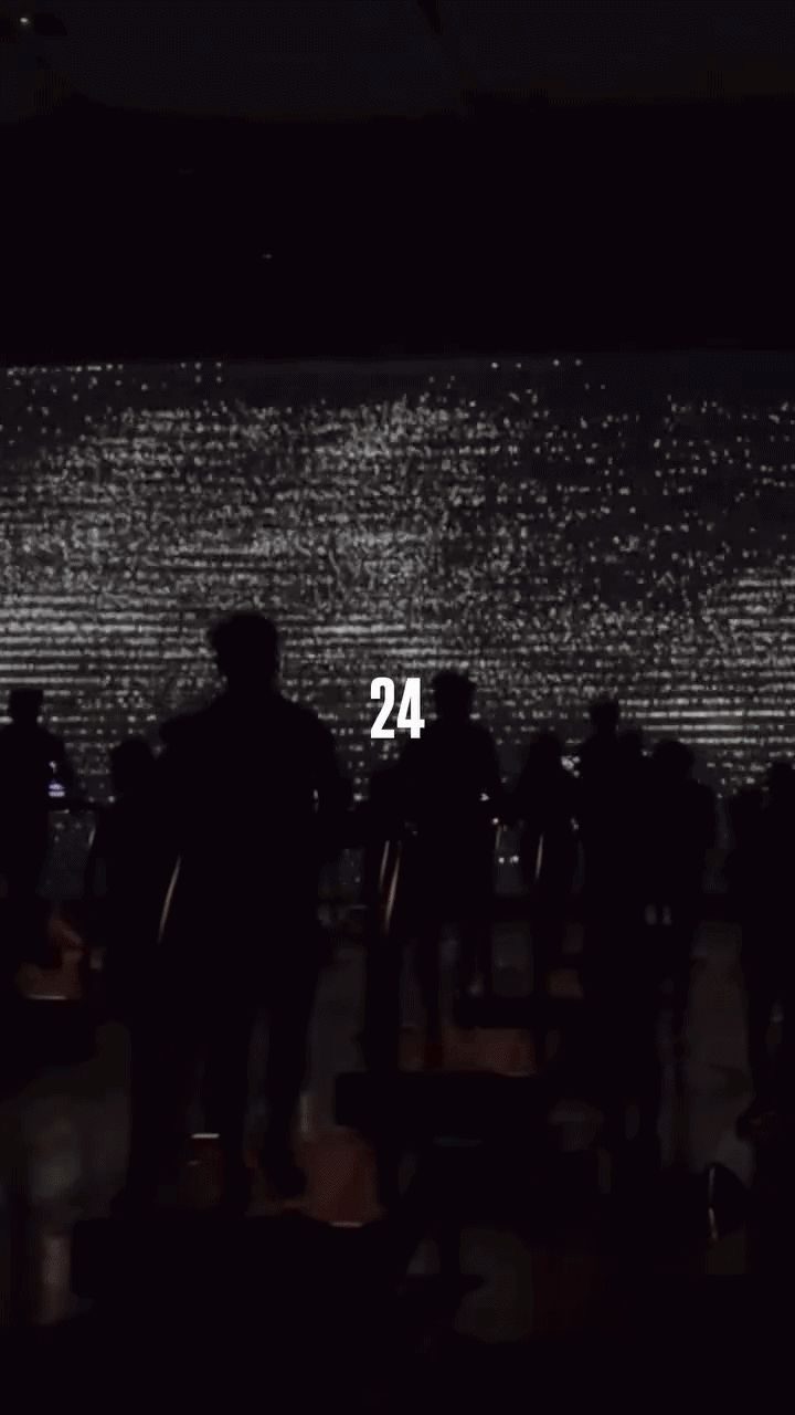 Crowd in a dark light room